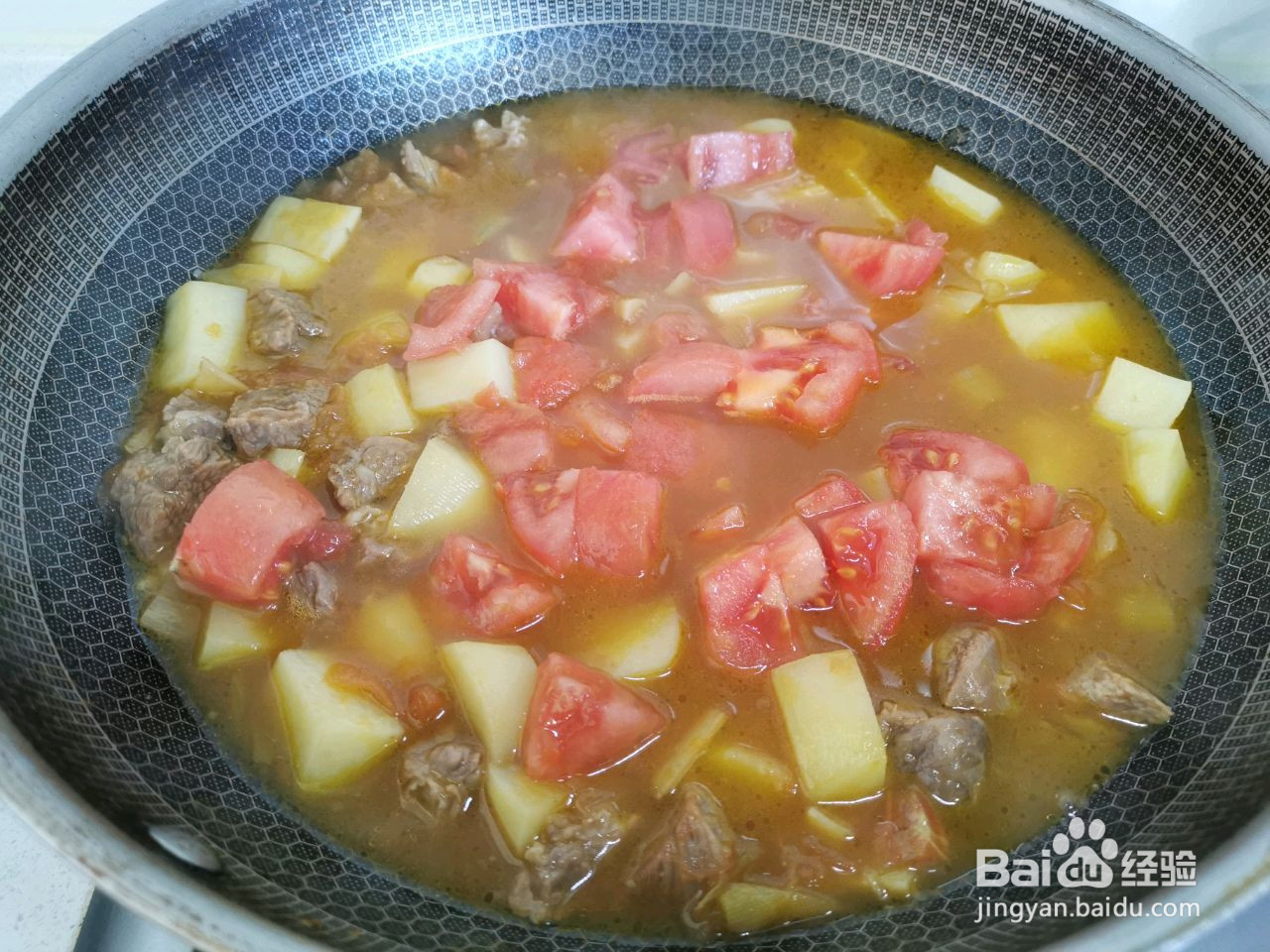 西红柿土豆烧牛腩的做法