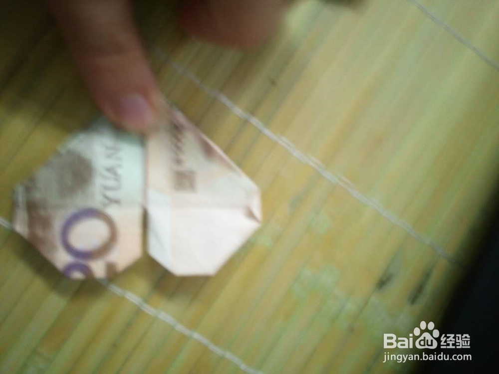 如何用纸币折爱心