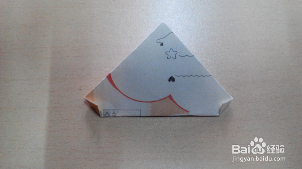 利用纸币或者折纸折一颗心的折法