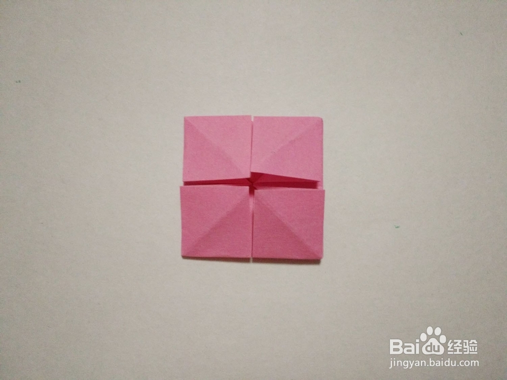 粉嫩的十二瓣立体纸花的折纸方法