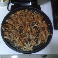 煎五花肉卷金针菇