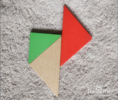 用七巧板怎样拼一个跳台上跳水的运动员呢?