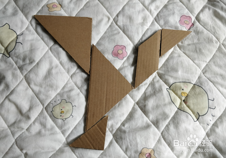 用七巧板怎么拼一个表演帽子舞的少年呢