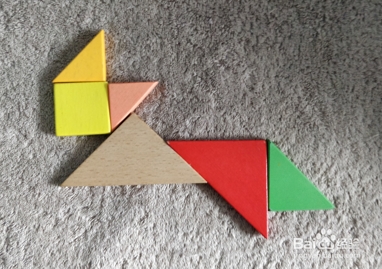 用七巧板怎样拼一只伸懒腰的猫？