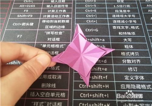 如何用纸折好看的四角小花