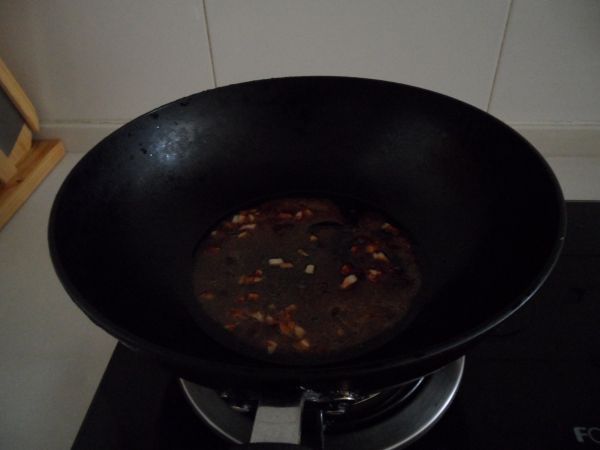 黄豆酱汁淋铁板茄