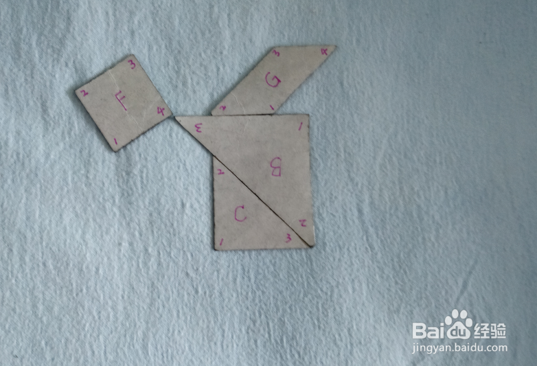 用七巧板怎样拼一个踮脚尖的舞者？