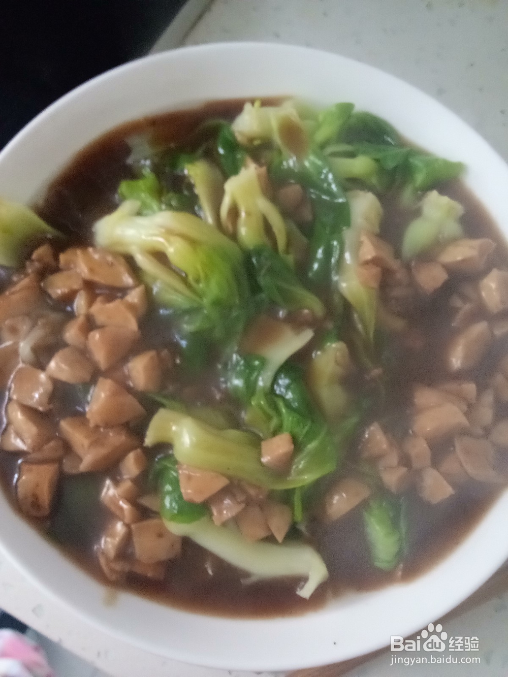 火锅丸子浇汁上海青