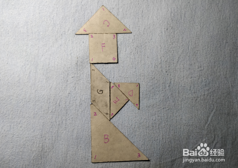 用七巧板怎样拼一个拿着手绢的女士?