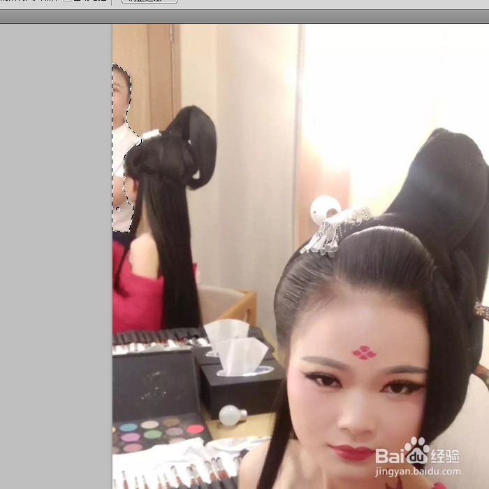 如何把照片中的人物P掉