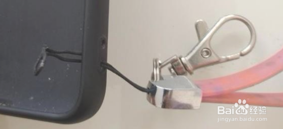 买手机壳送的挂绳怎么用