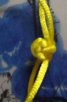 怎样用中国结编小狗