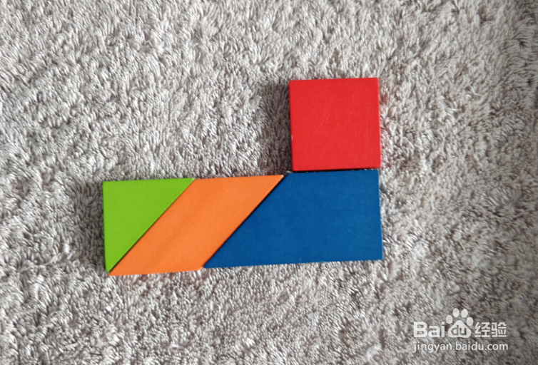 用九巧板拼图玩具怎样拼一艘货轮?