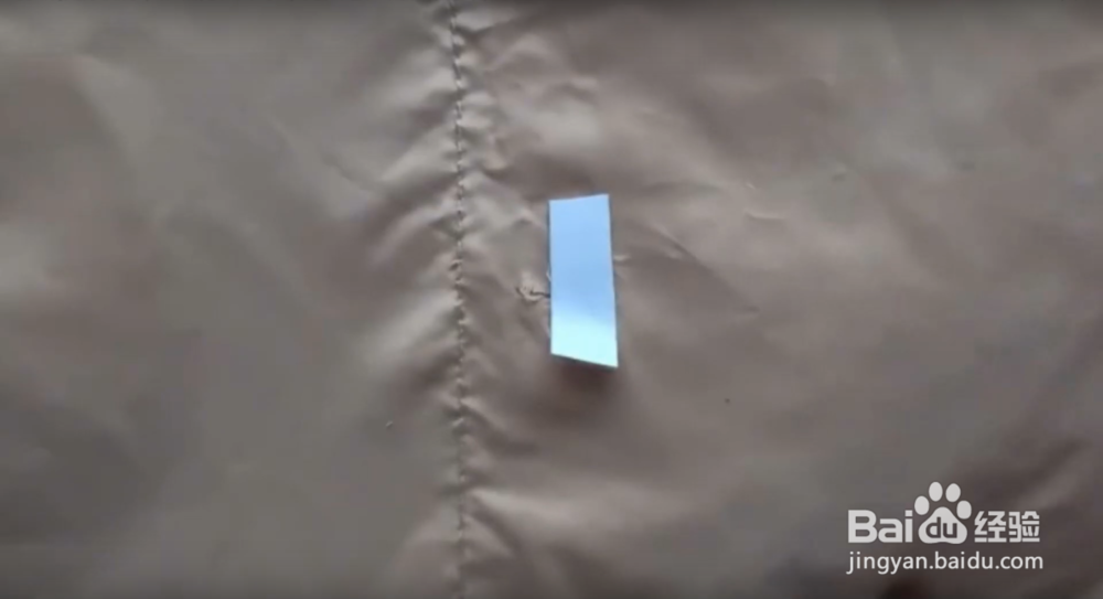 羽绒服刮个口子怎么补