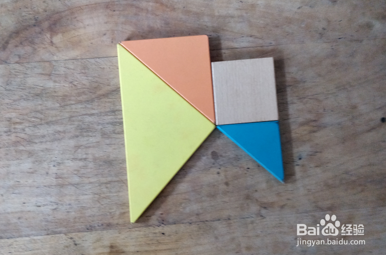 用七巧板怎样拼一只低着头的鸟儿？