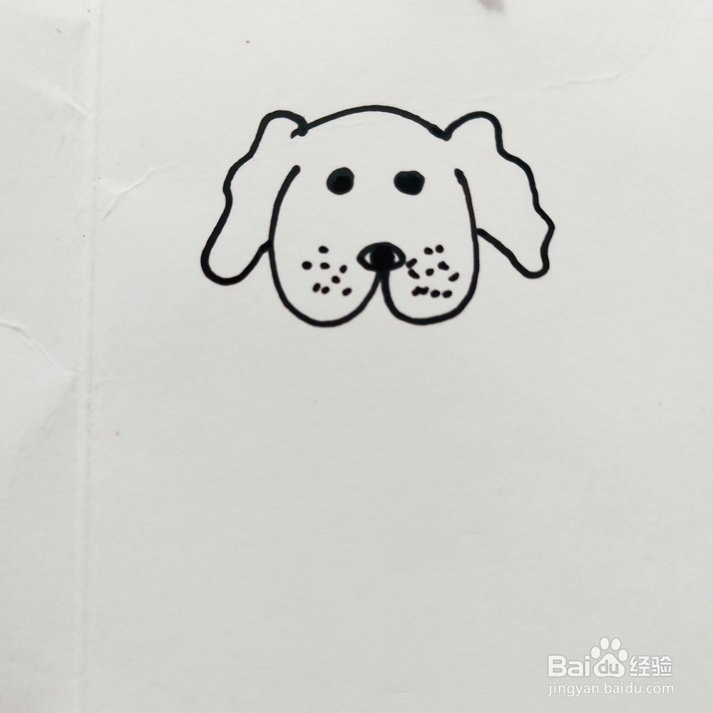 我们如何来画一只可爱的小狗狗简笔画呢