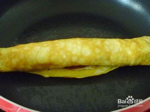 【简单制作的花样饼大全】快手早餐家里吃----火腿双色鸡蛋饼