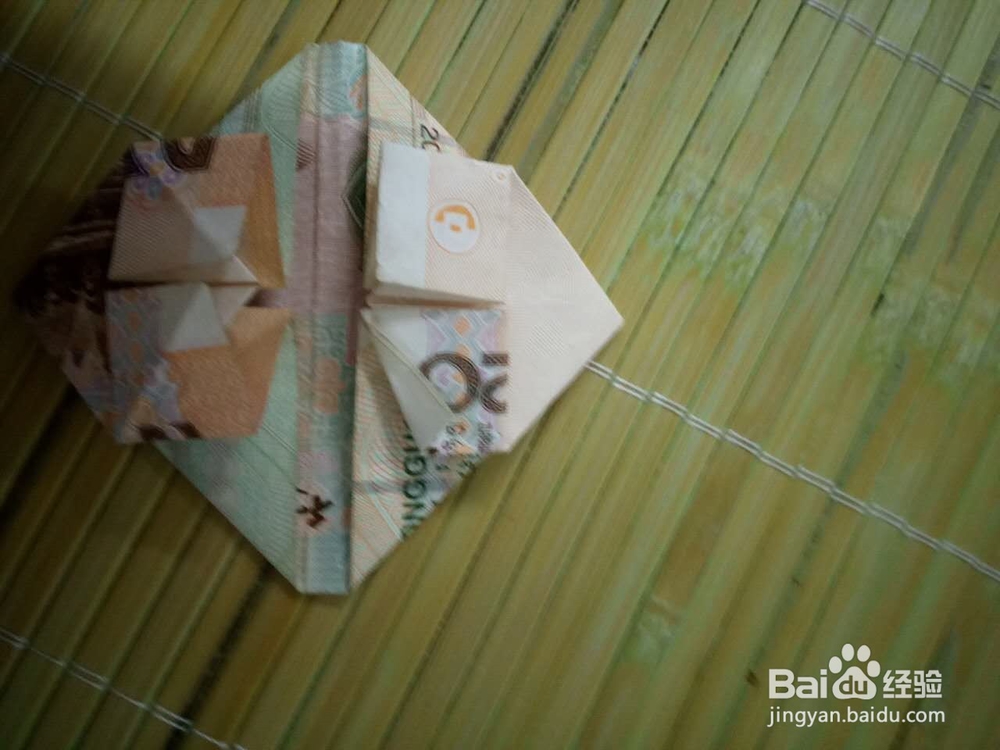 如何用纸币折爱心