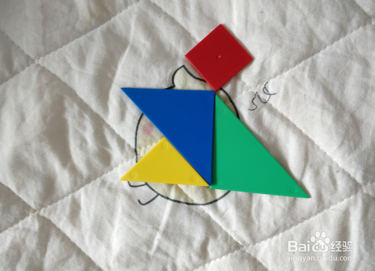 用七巧板智力拼图怎么拼一个赶忙跑出去的人？