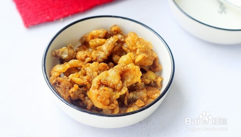 酸豆角炒鸡油渣的做法