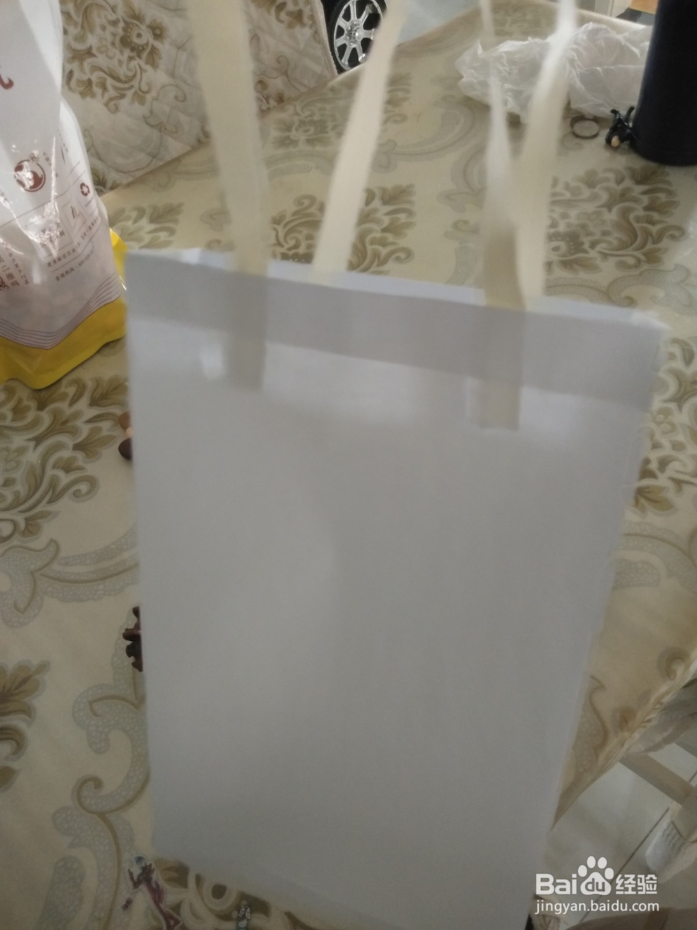 幼儿园手工怎么用A4纸做环保购物袋