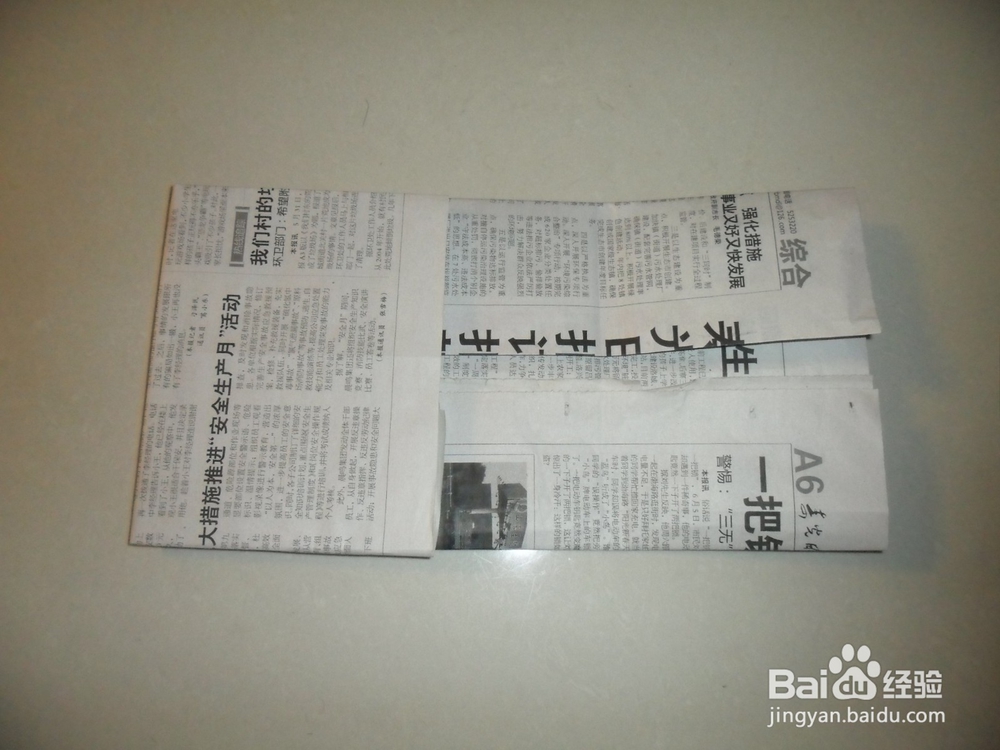 旧报纸怎么做时装