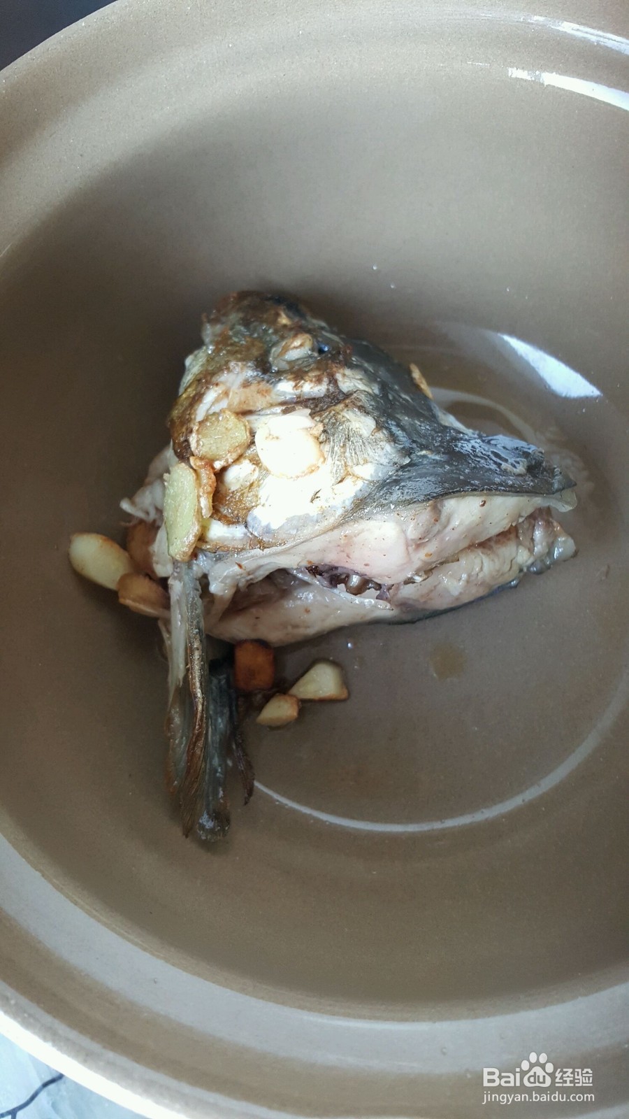 怎样制作酸菜鱼头汤