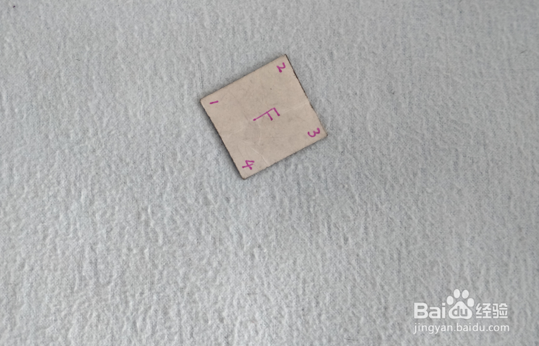 用七巧板怎样拼一个坐在船上沉思的人