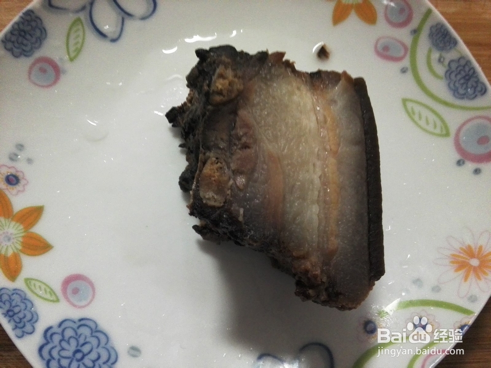 南瓜花炒腊肉的做法