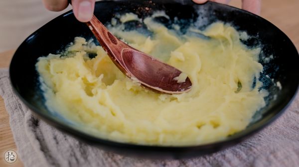 浇汁干贝土豆圆