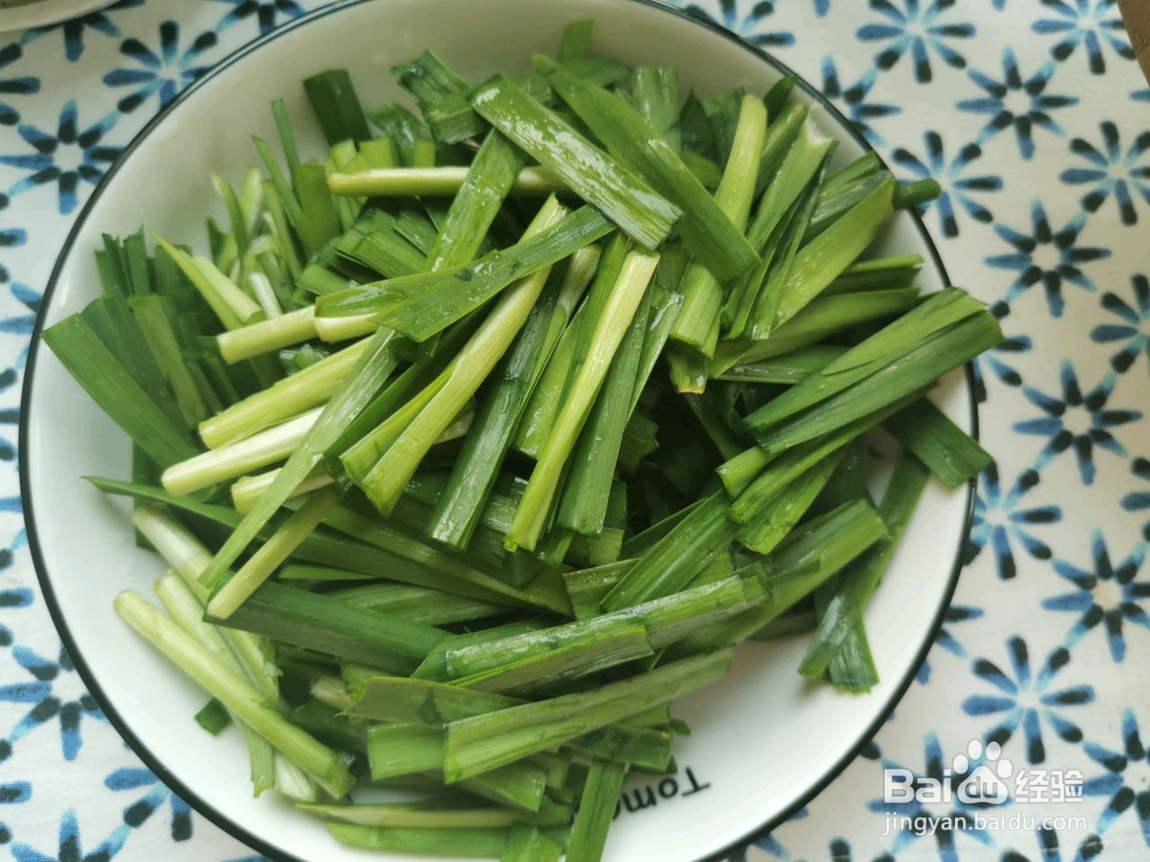 螺蛳头炒韭菜的做法