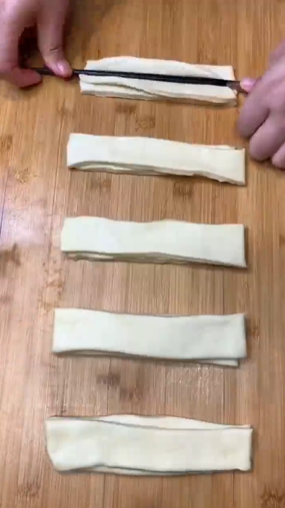 怎样做大油条？