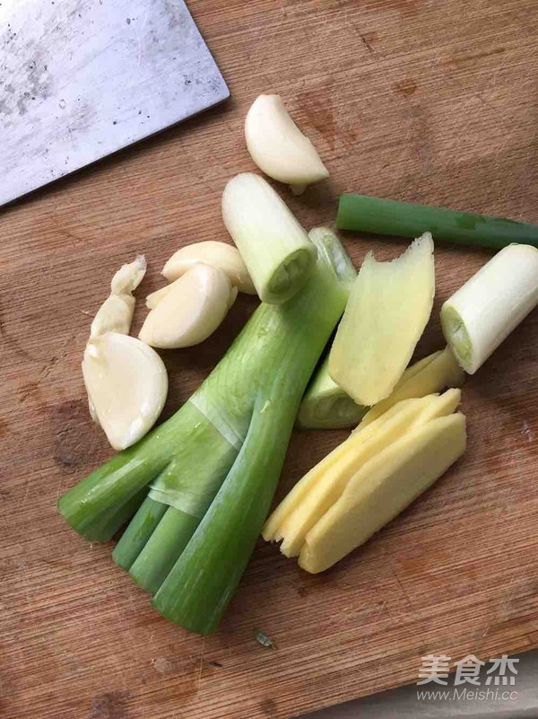 鱼头炖豆腐的做法