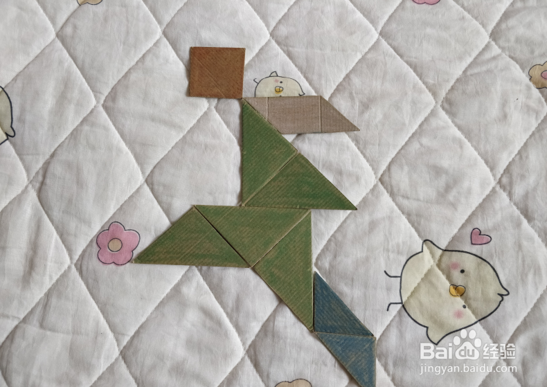 用九巧板怎么拼一个终点冲刺的小哥哥呢？