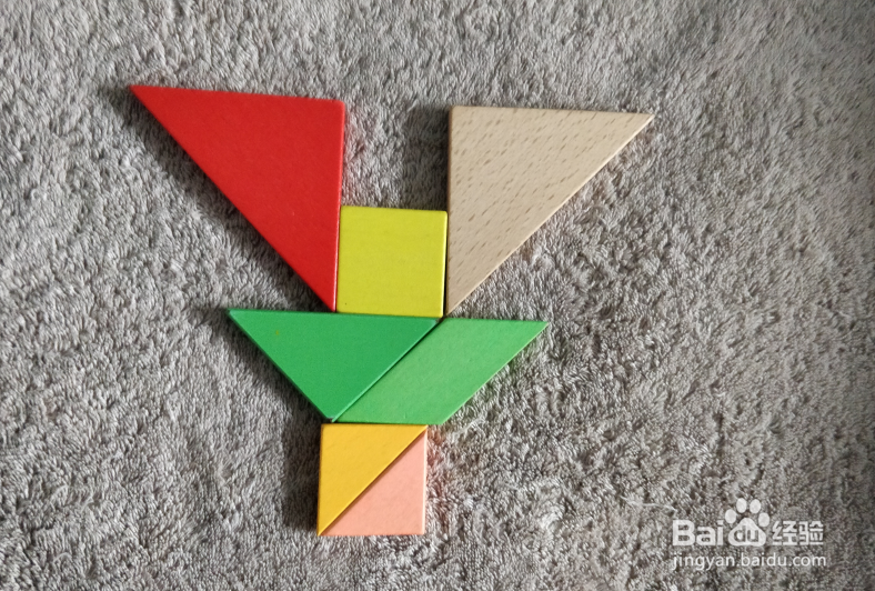 用七巧板怎样拼一只红酒起子？