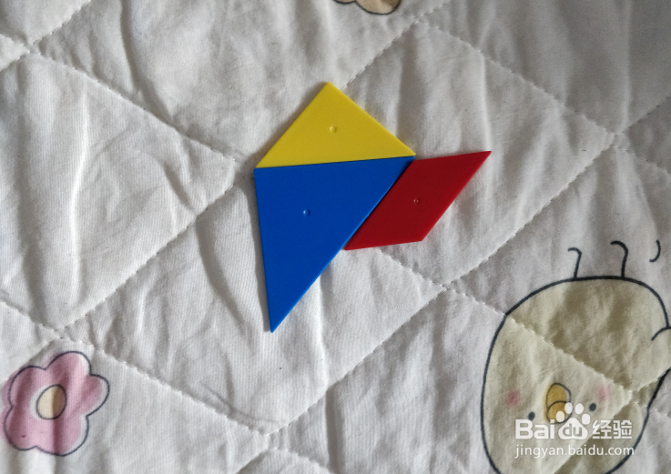 用七巧板智力拼图怎么拼一只长尾观赏鸡？