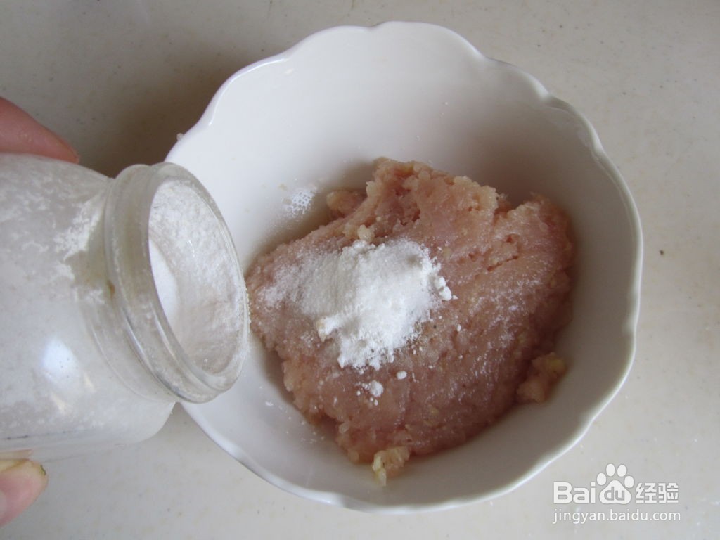 草菇焖鸡丸的做法