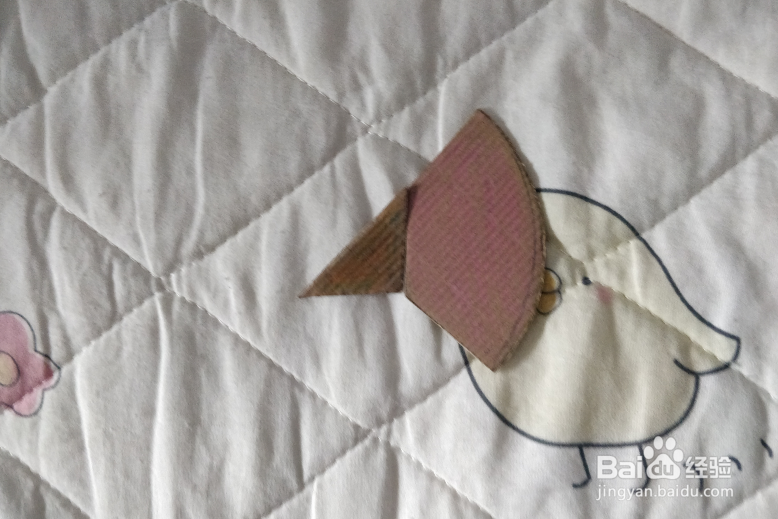 用蛋形九巧板怎么拼一只回头的犀鸟