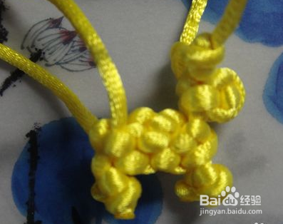 怎样用中国结编小狗