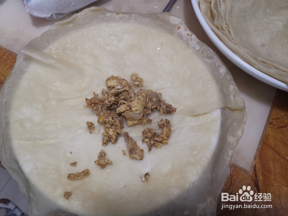 怎么做辣酱味土豆萝卜丝卷饼