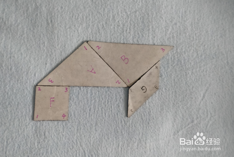 用七巧板怎样拼一头站着的犀牛？