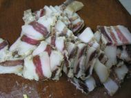 腊肉干烧茶树菇的做法