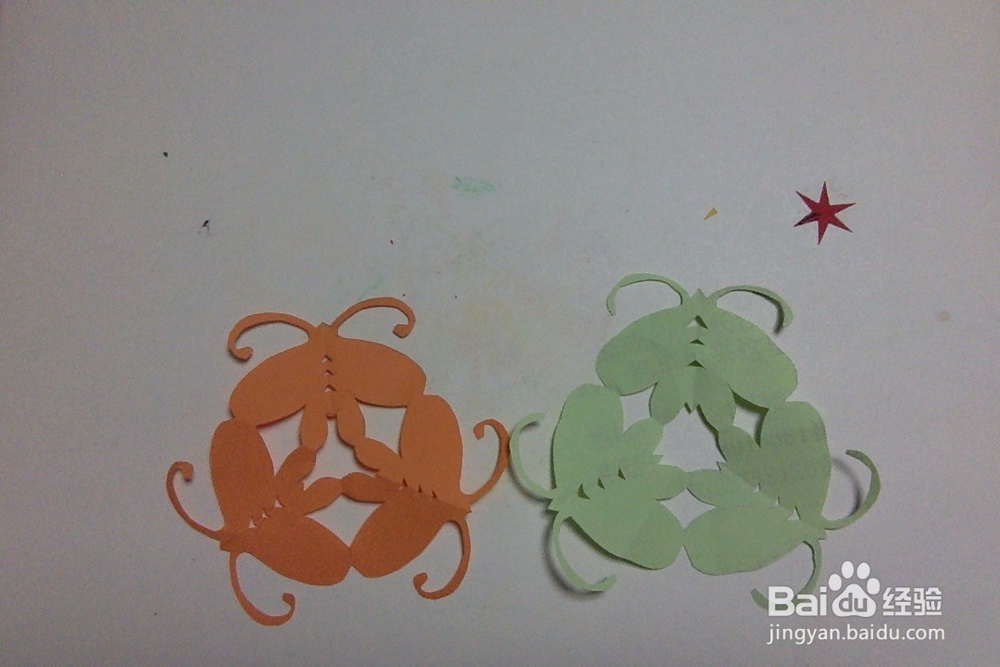 怎样剪蝴蝶窗花?手工三角团花