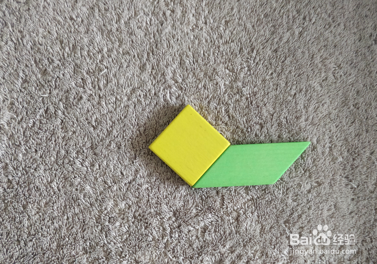 用七巧板怎样拼一条旗鱼?