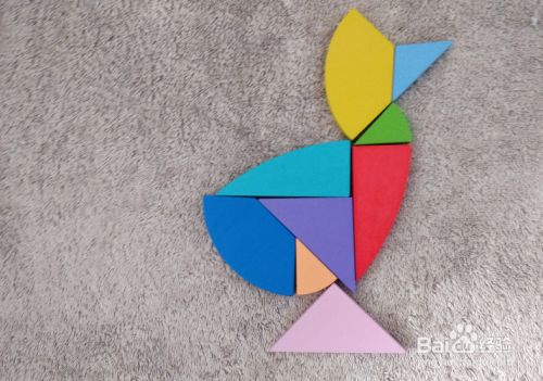 用九巧板拼图玩具怎样拼一只雏鸭?