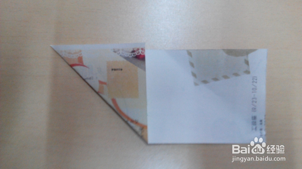 利用纸币或者折纸折一颗心的折法