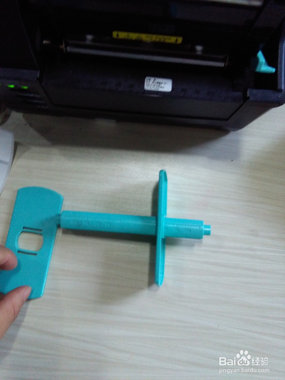 怎样安装博思得的打印机标签纸