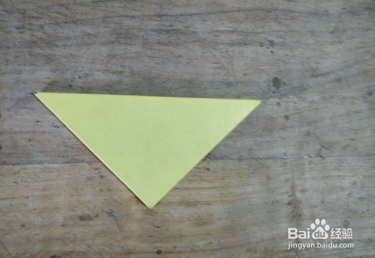 用七巧板怎样拼一座建在小岛上的房子？