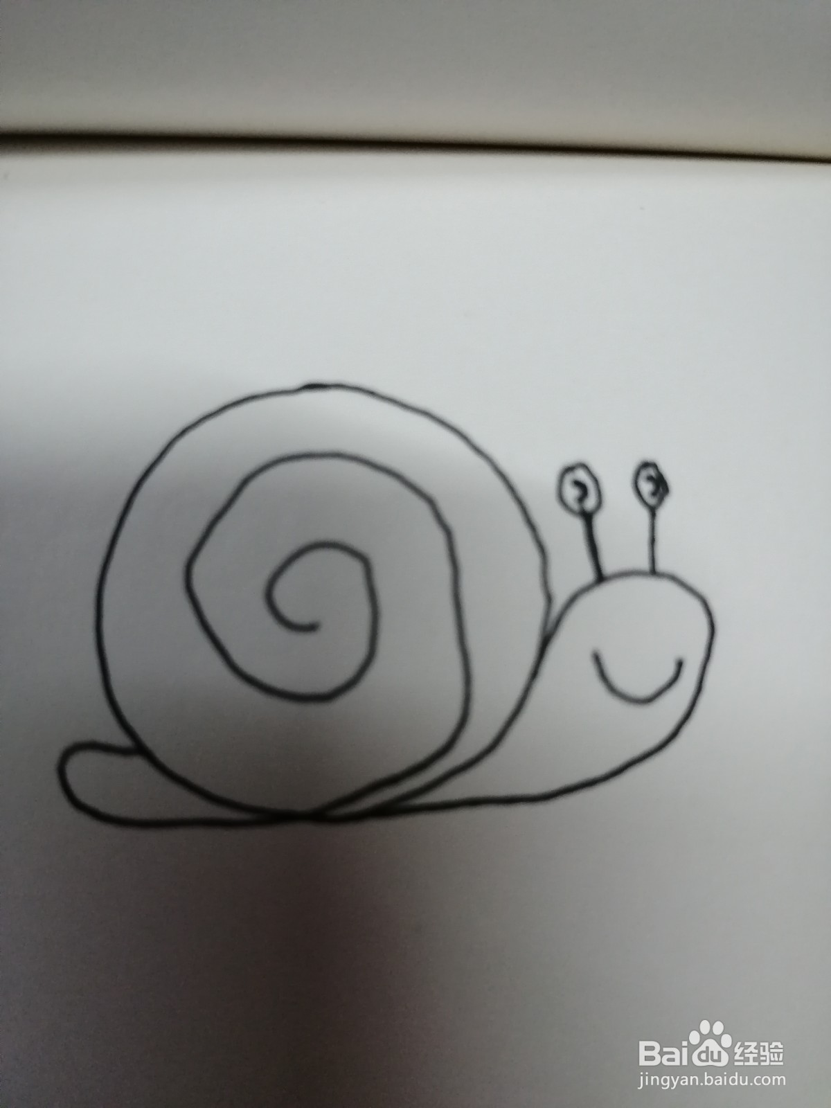 如何用圆形画出可爱的简笔画蜗牛？