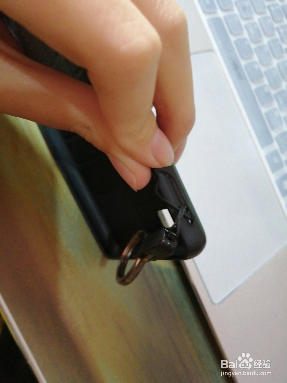 买手机壳送的挂绳怎么用